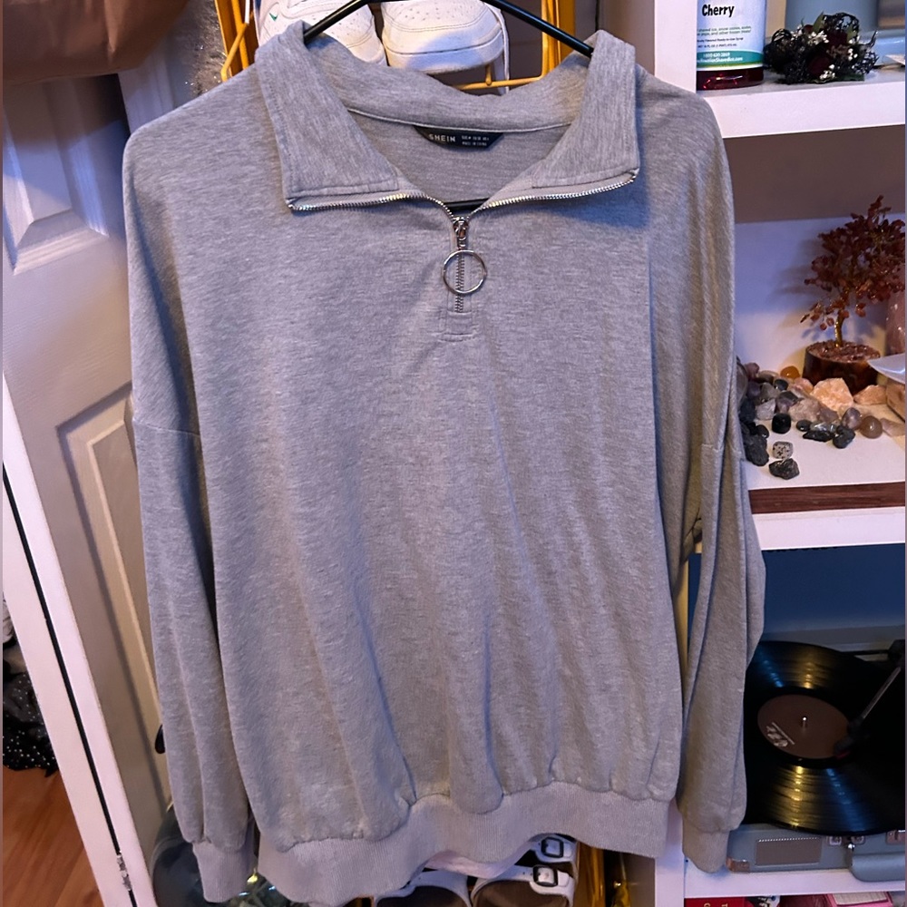 Gray women’s sweatshirt